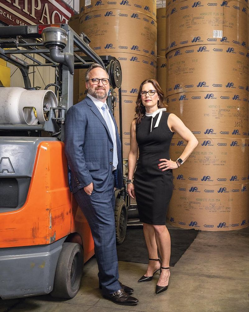 John and Jennifer Garrett, founders of Community Impact Printing, at their Pflugerville facility