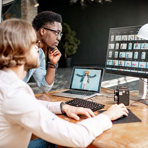 Graphic design team creating marketing materials